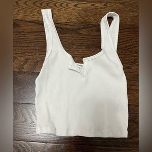 Garage- white tank with small v cutout